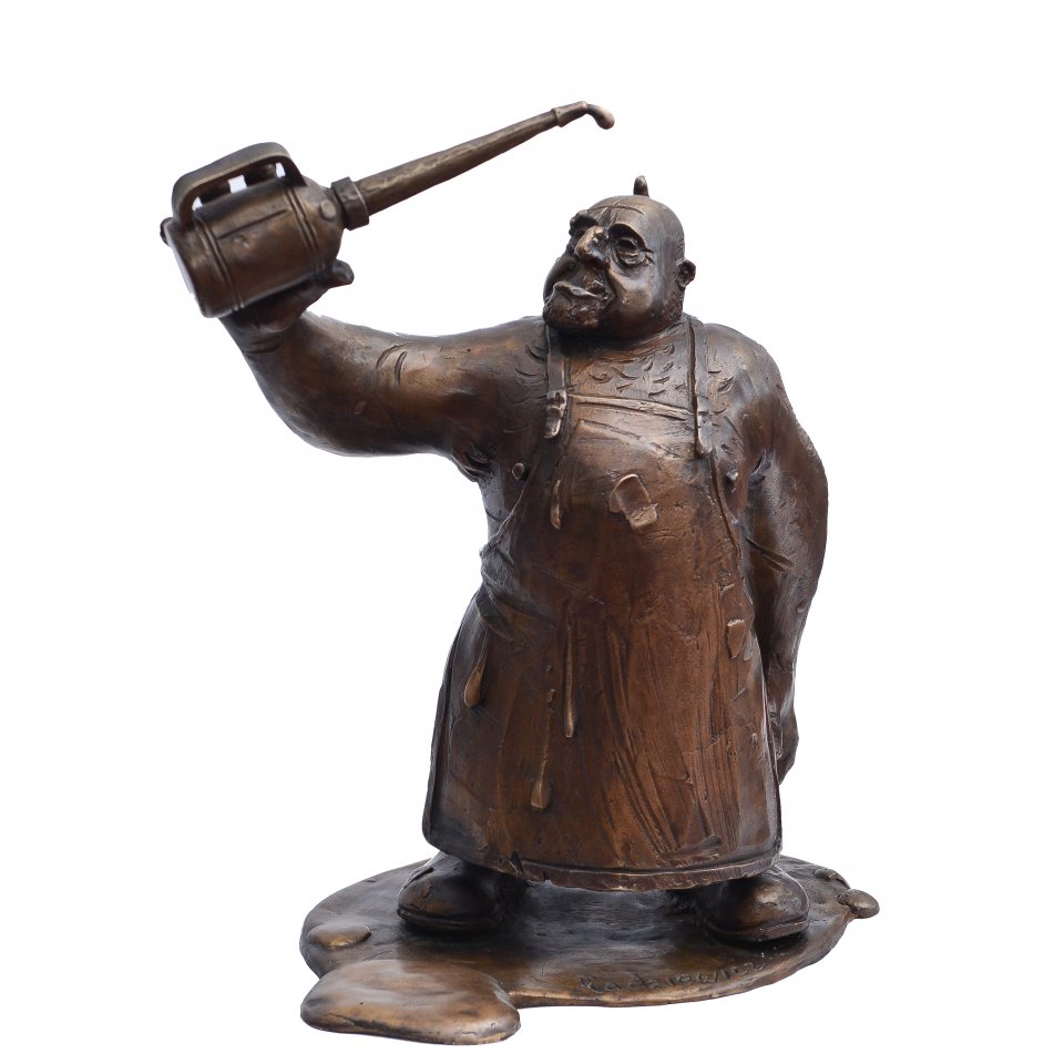 Zdjęcie przedstawia rzeźbę stolema